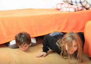 kids slinking from under bed