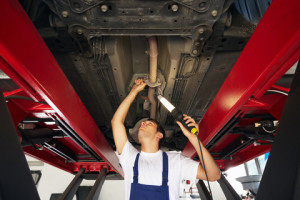 mechanic under car